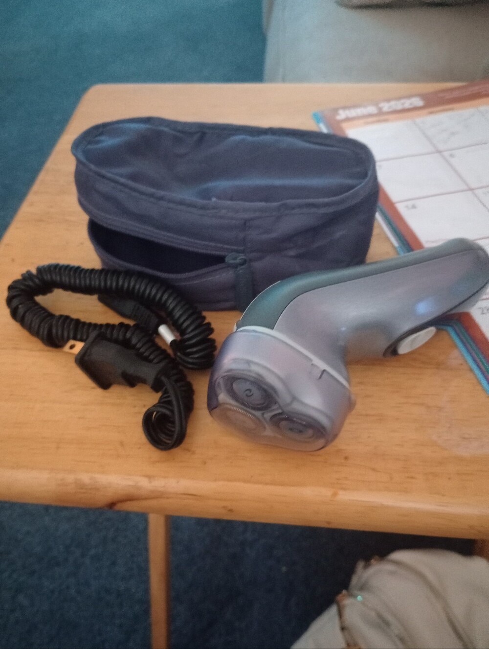Norelco Reflex Plus. Electric Rotary Shaver with Travel Case - Silver/Teal